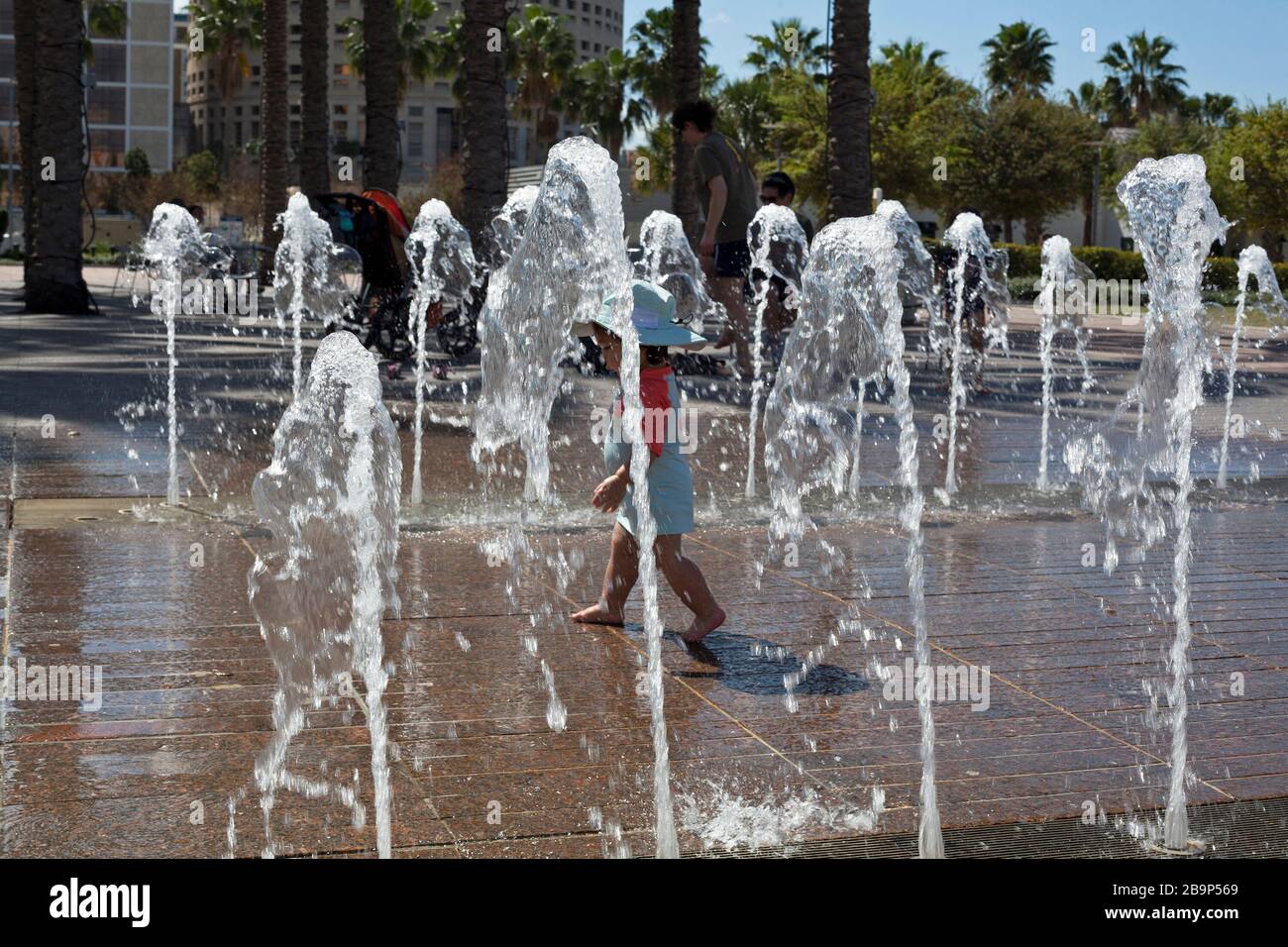 Water play is enjoyed by families at Curtis Hixon Waterfront Park in Tampa, Florida, USA. Stock Photo