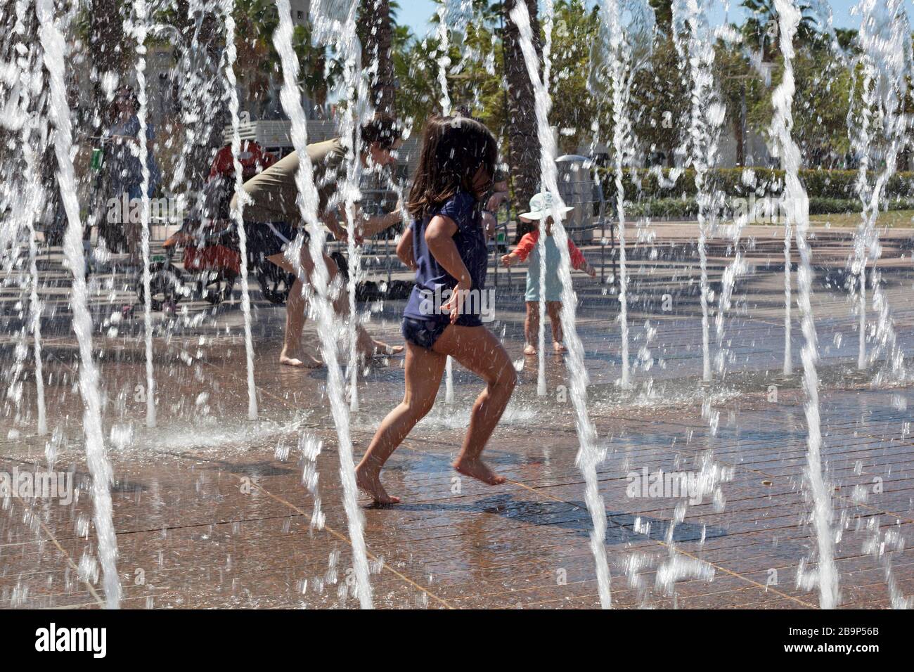 Water play is enjoyed by families at Curtis Hixon Waterfront Park in Tampa, Florida, USA. Stock Photo