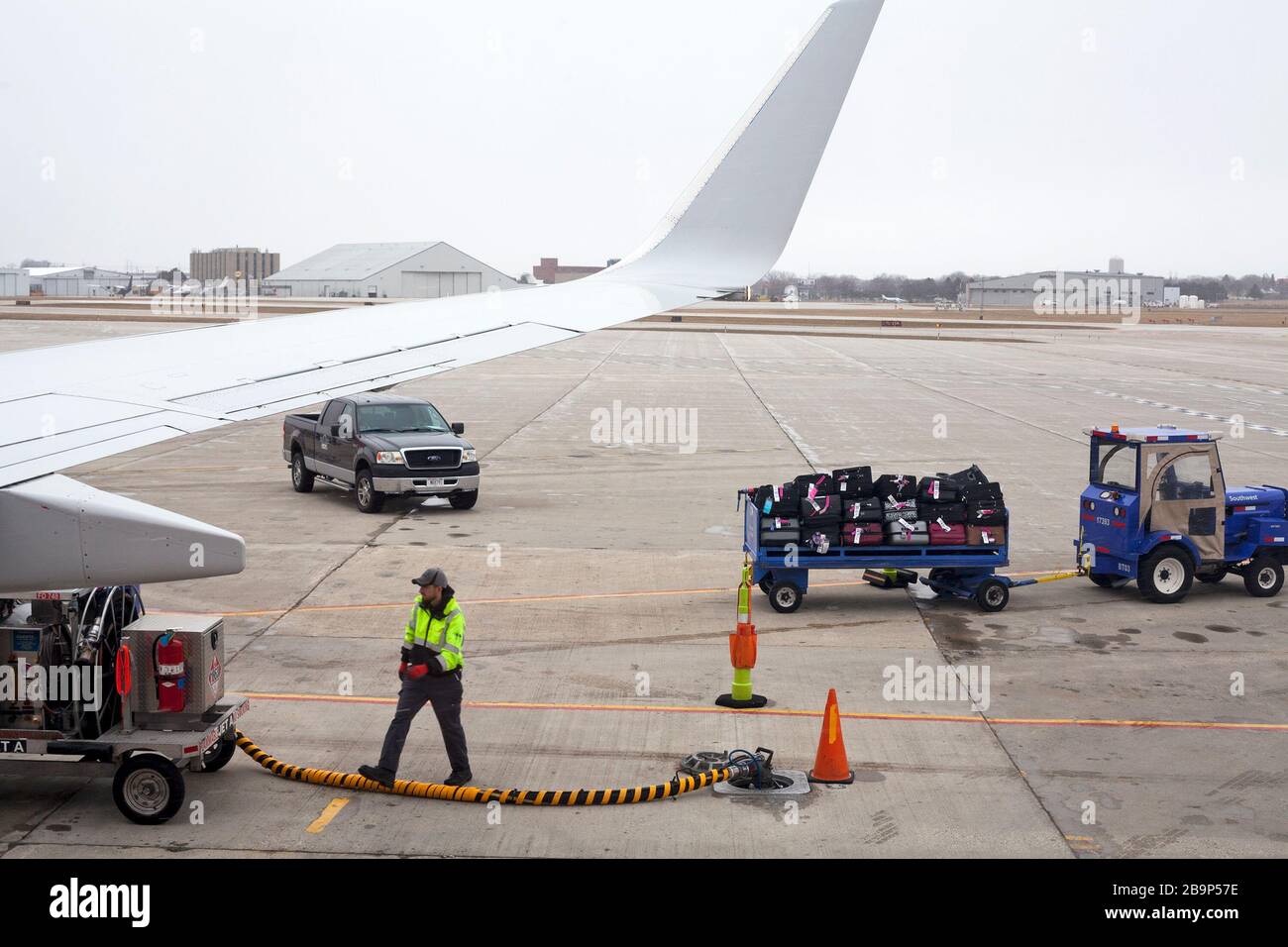 Airline employees working at Milwaukee Mitchell International Airport in Wisconsin, USA. Stock Photo