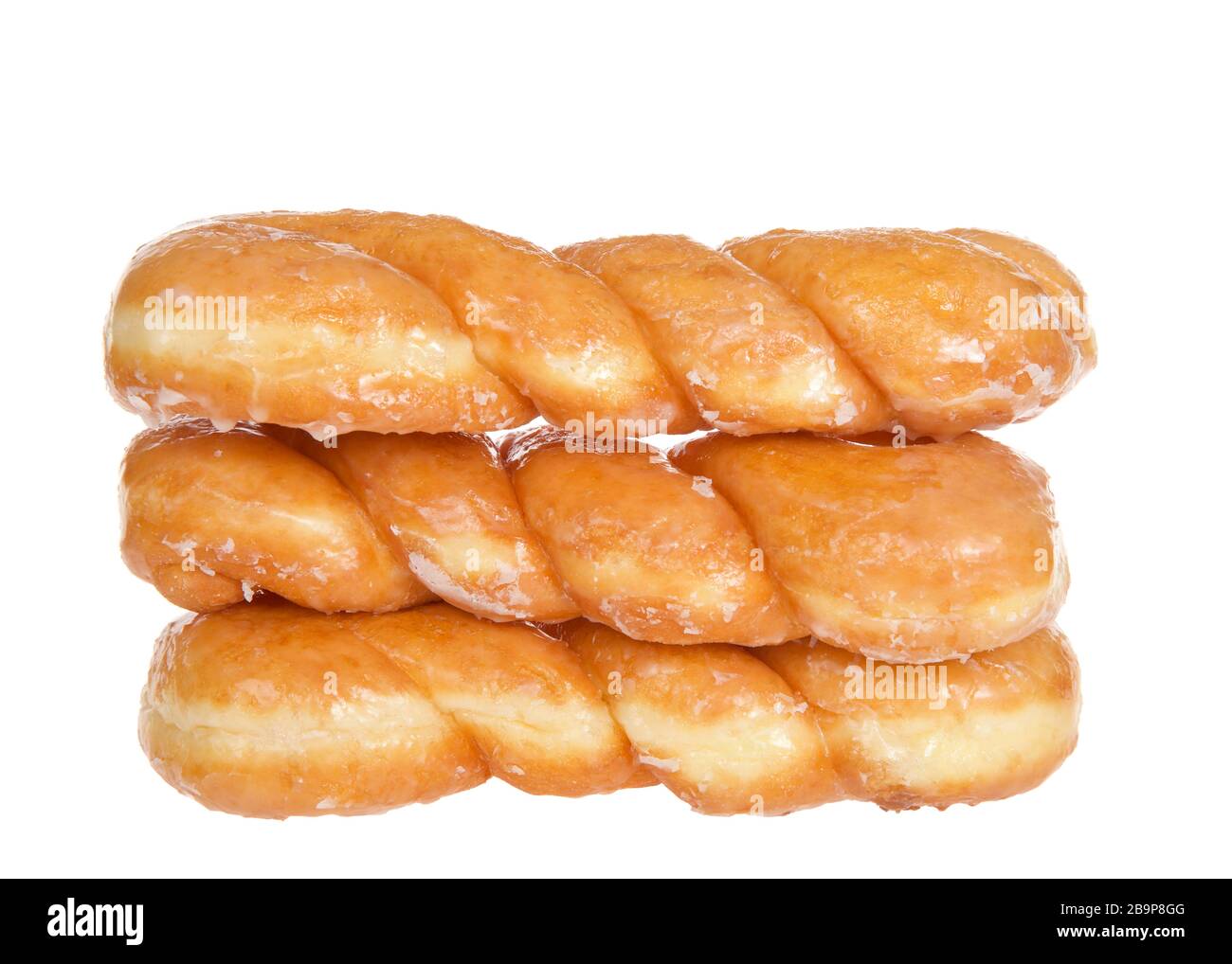 Stack of three glazed twist donuts isolated on white background Stock Photo Alamy