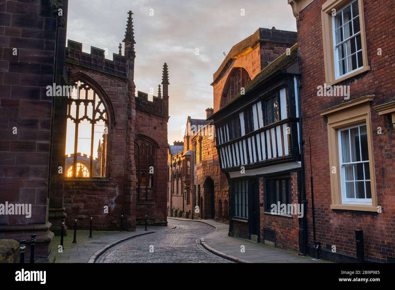 Old Coventry Cathedral and Bayley Lane at sunrise in the spring. Coventry, West Midlands, England Stock Photo