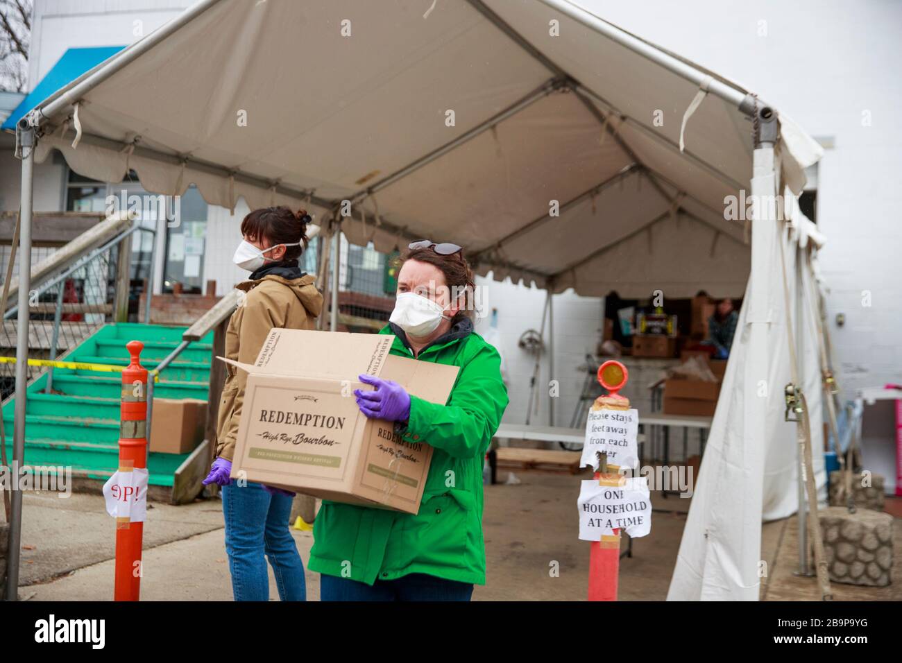 Bloomington, United States. 24th Mar, 2020. Amanda Nickey, green jacket