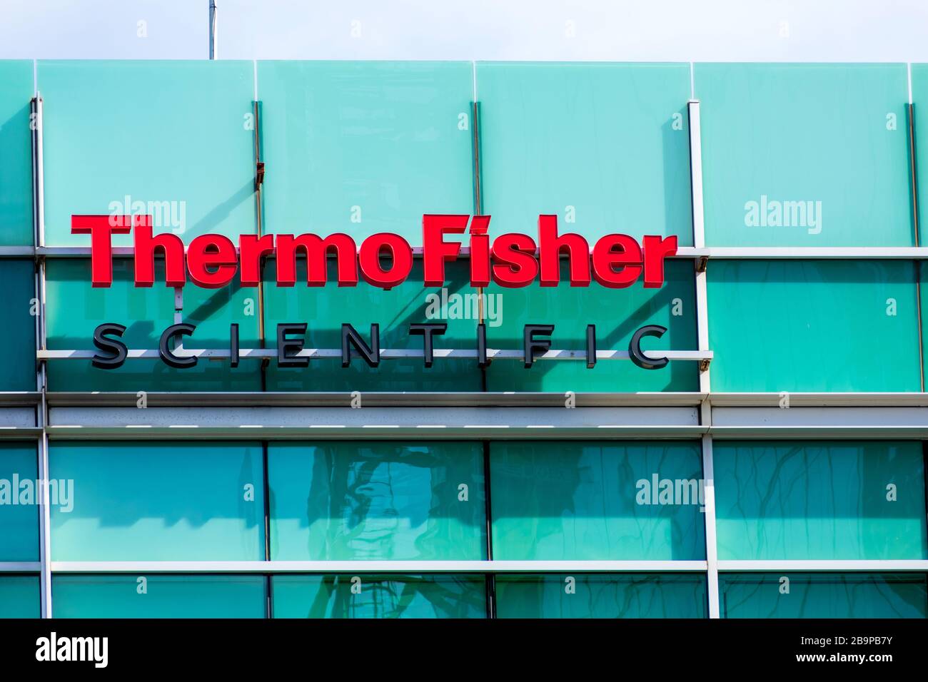 Thermo Fisher Scientific sign on company office in Silicon Valley, high-tech hub of San Francisco Bay Area - South San Francisco, California, USA - 20 Stock Photo