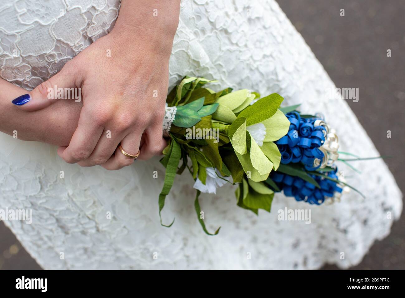 Alternative bride wearing cowboy boots Stock Photo