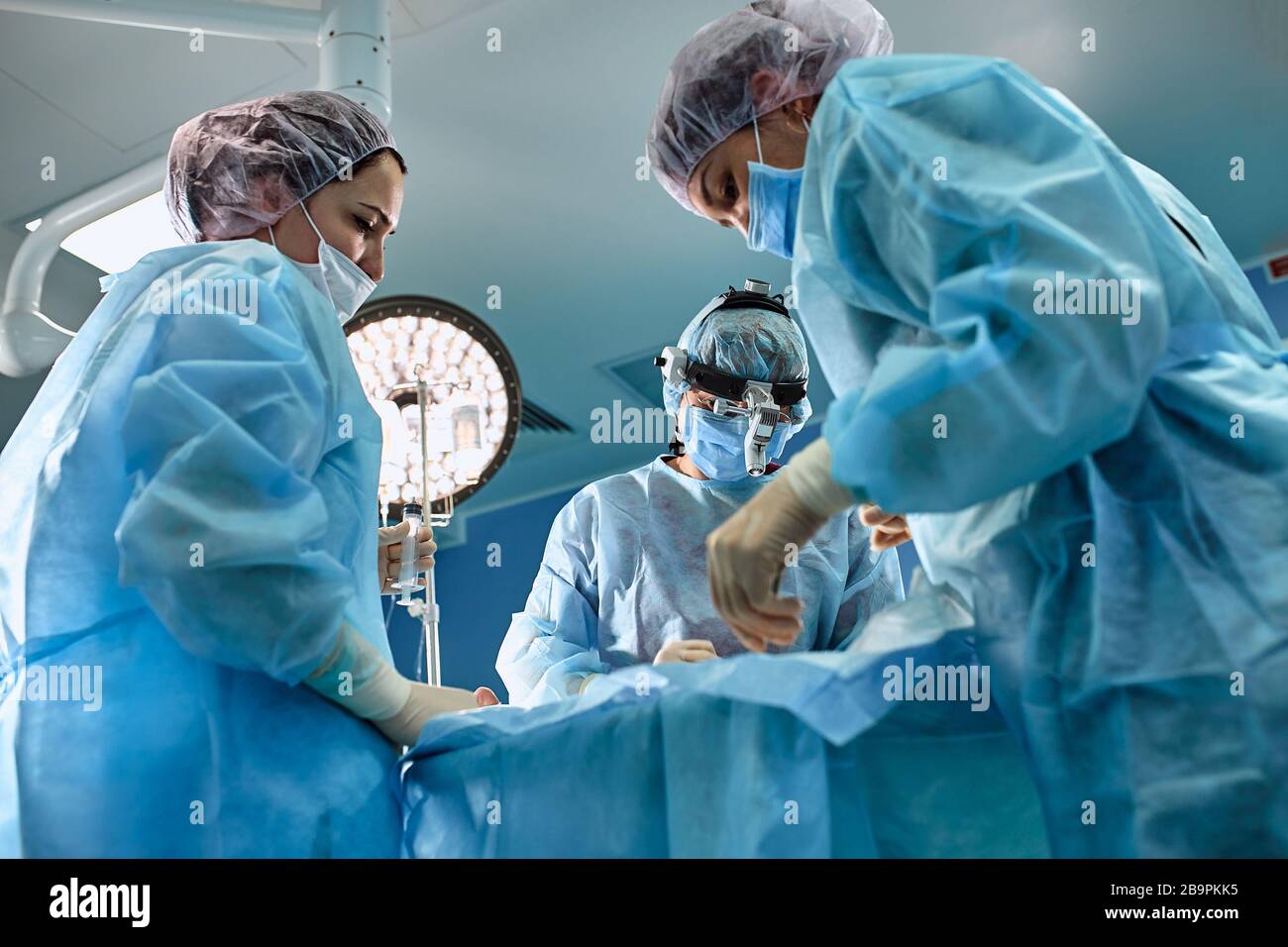 In the hospital operating room. An international team of professional ...