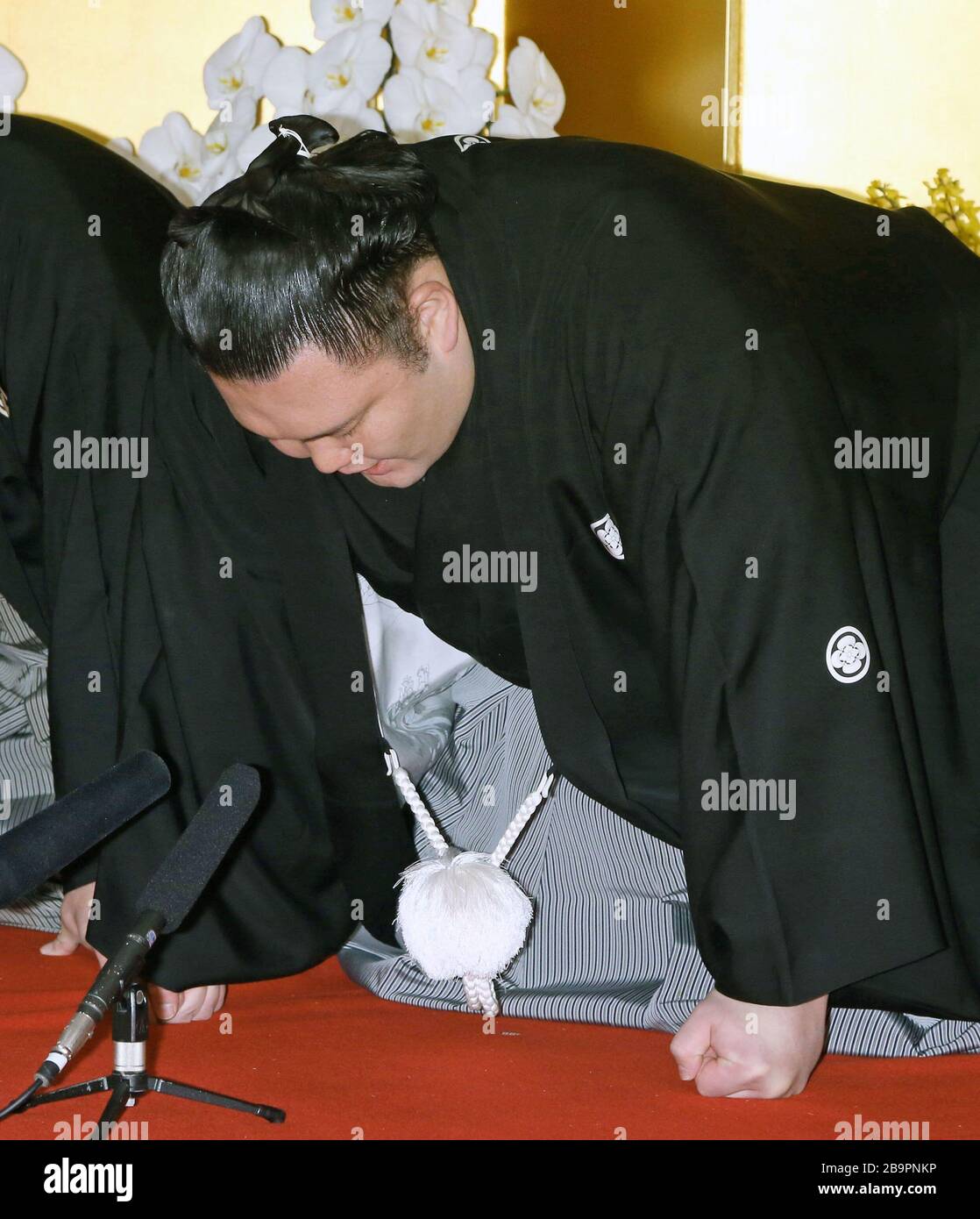 Sumo wrestler Asanoyama delivers his stage speech after accepting his