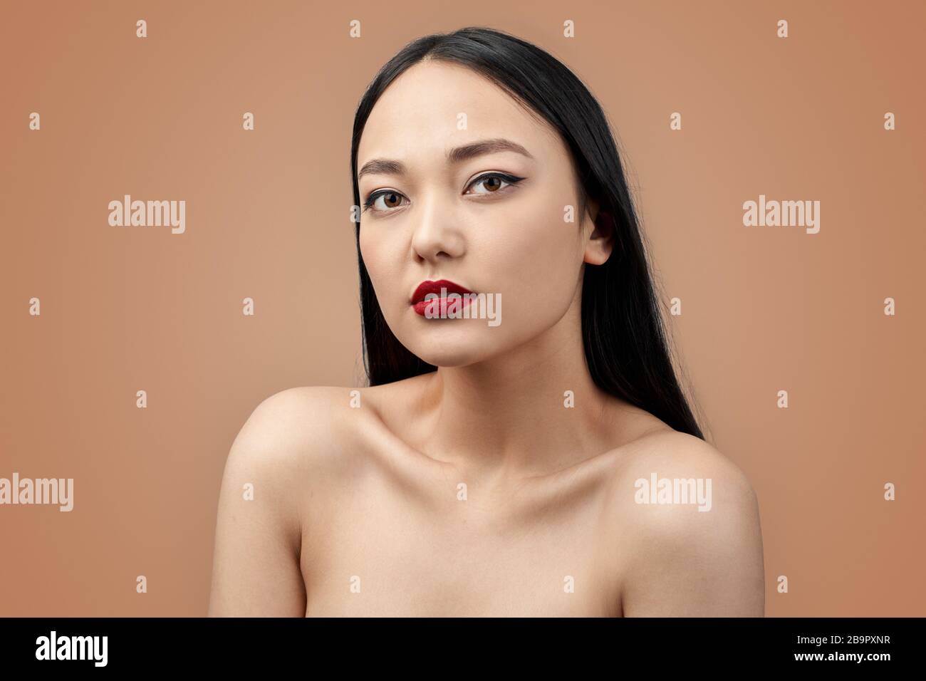 chinese young naked Freestyle. Chinese woman naked standing isolated on grey posing sensual  close-up Stock Photo - Alamy