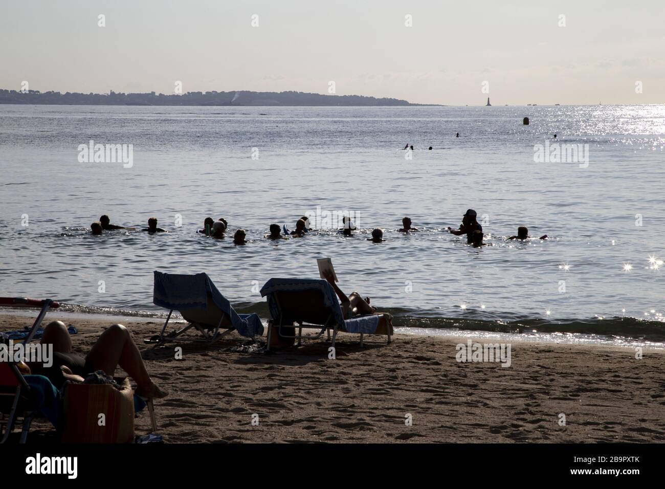 An early morning aquagym class in the sea in Cannes on the french riviera. Stock Photo