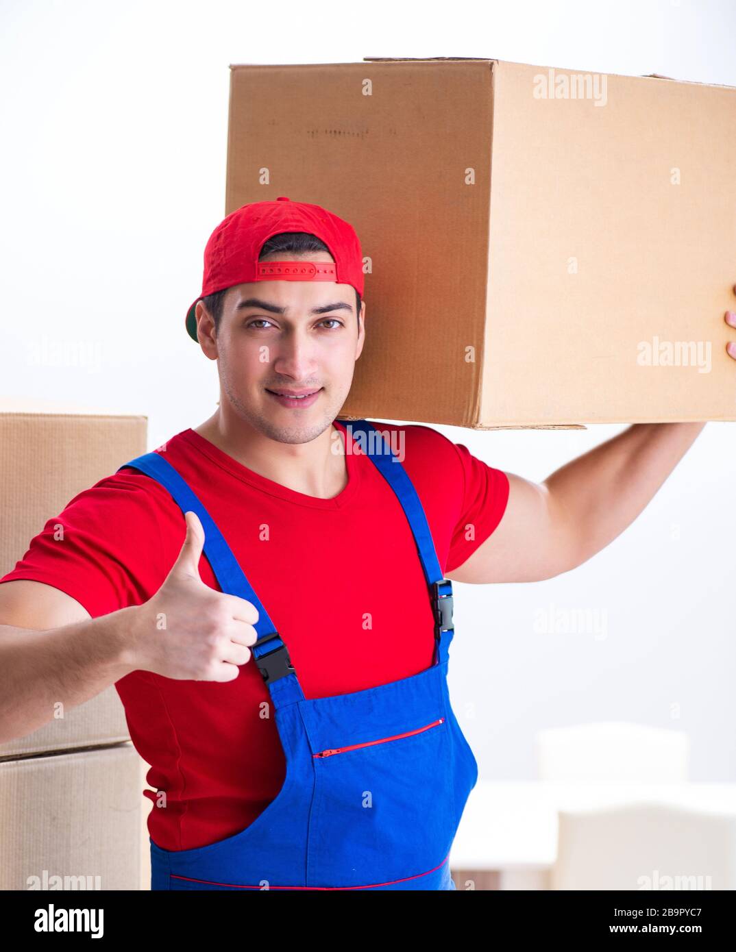 The contractor worker moving boxes during office move Stock Photo - Alamy