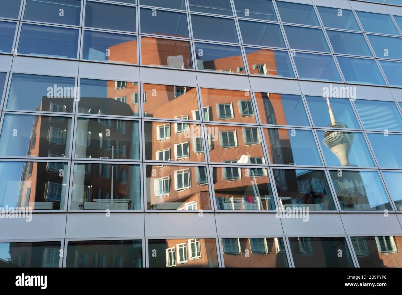 Modern building from Designer Frank O. Gehry at Neuer Zollhof, Düsseldorf, North Rhine-Westphalia, Germany, Europe Stock Photo