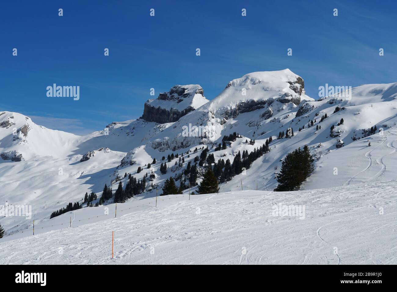 Rocks and rocky peaks surrounding the skiing slpes in the resort Hoch Ybrig Switzerland Stock Photo
