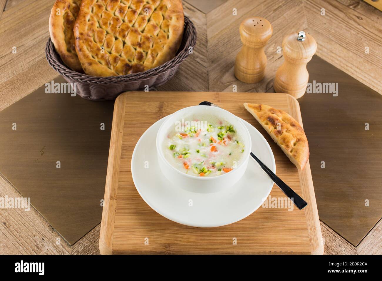 Yoghurt soup. Traditional Turkish soup with dry mint and hot pepper