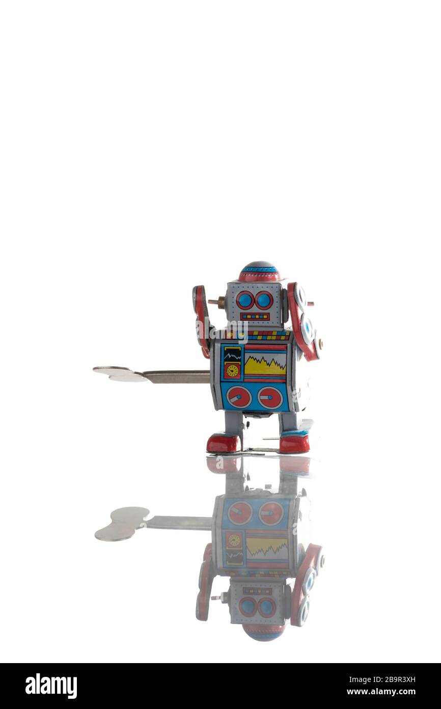Vintage toy robot isolated on white background Stock Photo