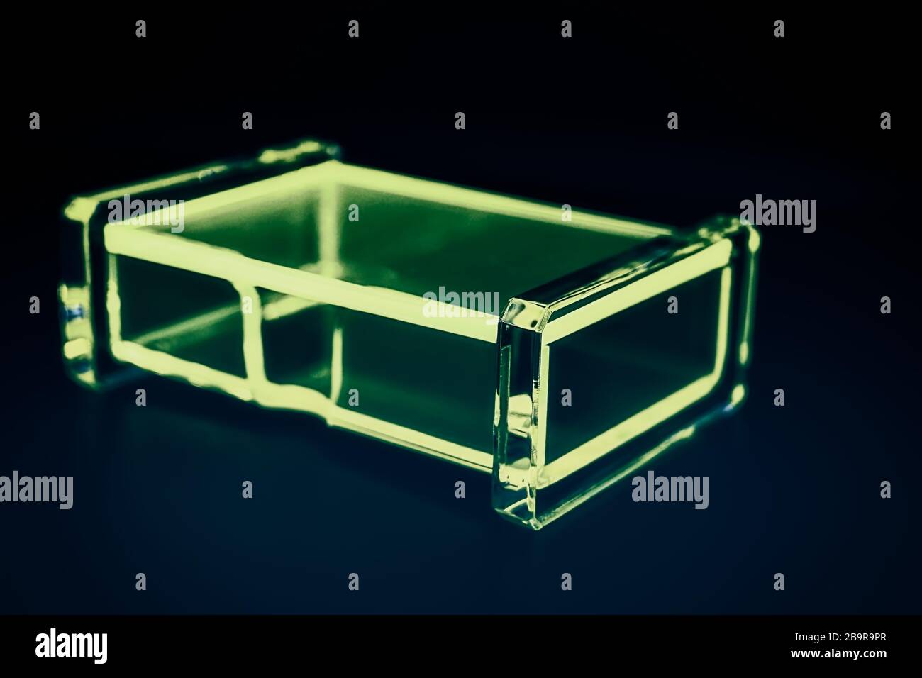abstract transparent plastic box dark background Stock Photo