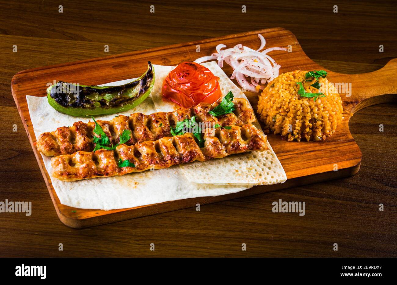 Various Barbecued Kebabs Kofta Chicken Tawook And Sumac Chicken With Tabouleh And Pitta Bread An Arab Or Lebanese Style Feast Stock Photo Alamy