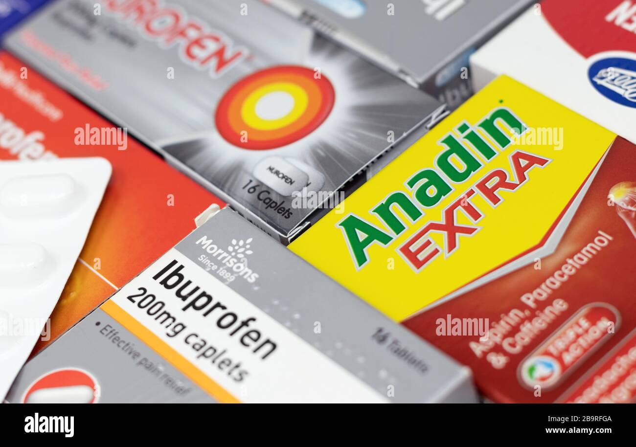 London / UK - March 15th 2020 - Anadin Extra and supermarket brands of painkillers with a very shallow depth of field Stock Photo