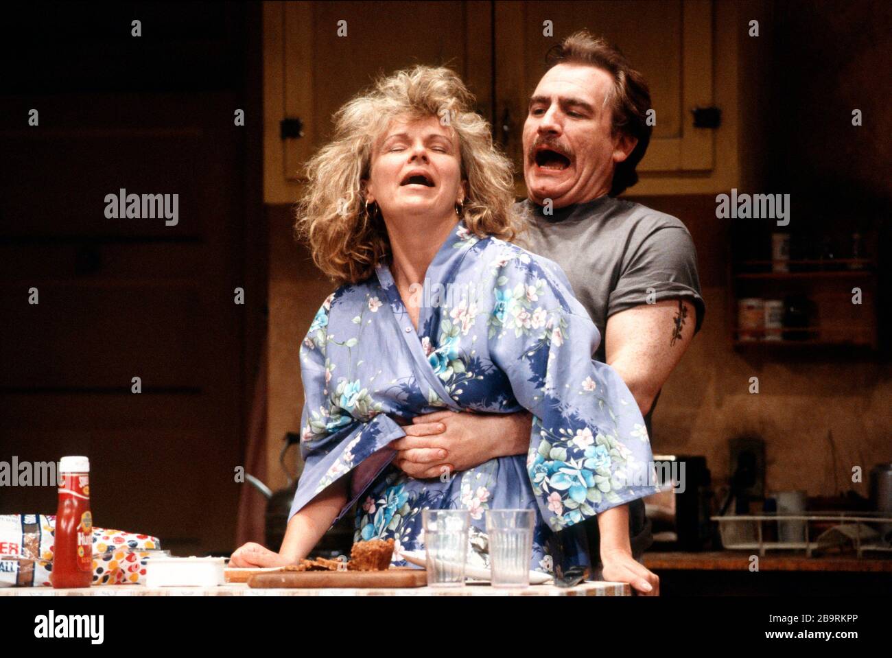 FRANKIE AND JOHNNY IN THE CLAIR DE LUNE by Terrence McNally design: Sue Plummer director: Paul Benedict  Julie Walters (Frankie), Brian Cox (Johnny) Comedy Theatre, London SW1 14/06/1989 Stock Photo