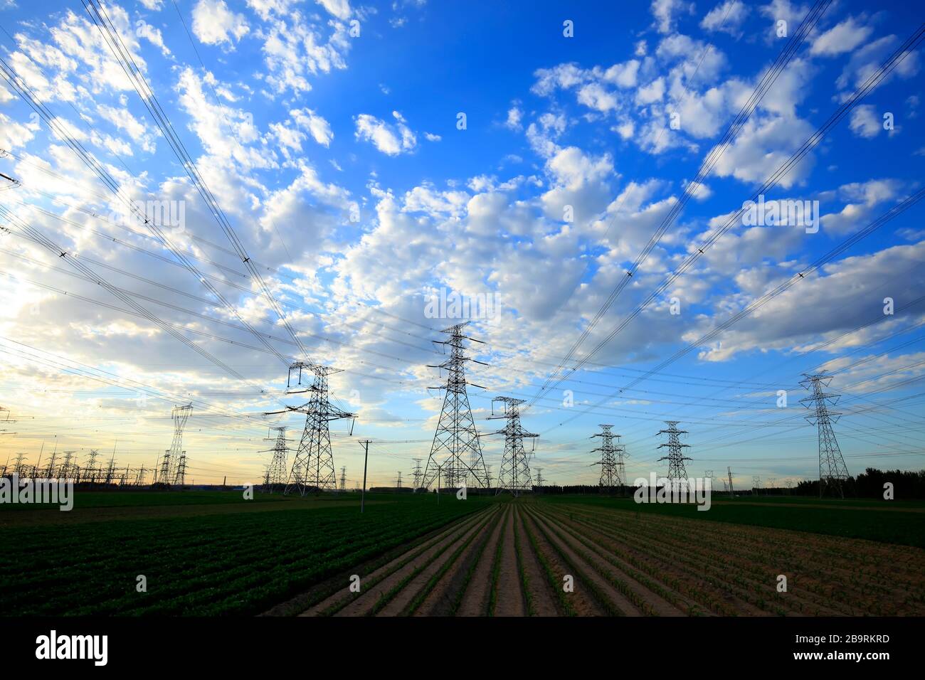 Pylon, the pylon under the blue sky white clouds Stock Photo - Alamy
