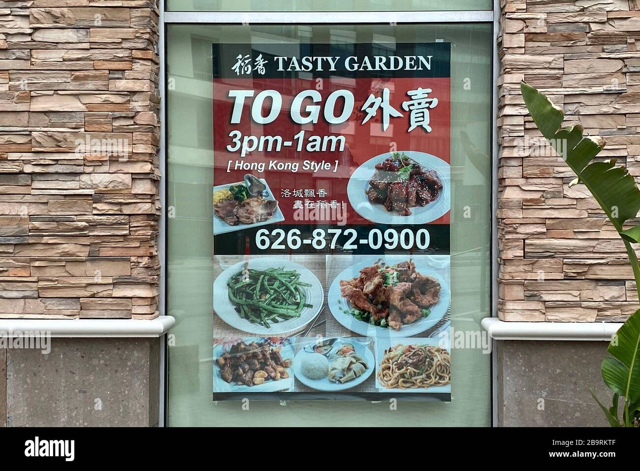 The Tasty Garden Restaurant To Go Sign In English And Chinese Amid