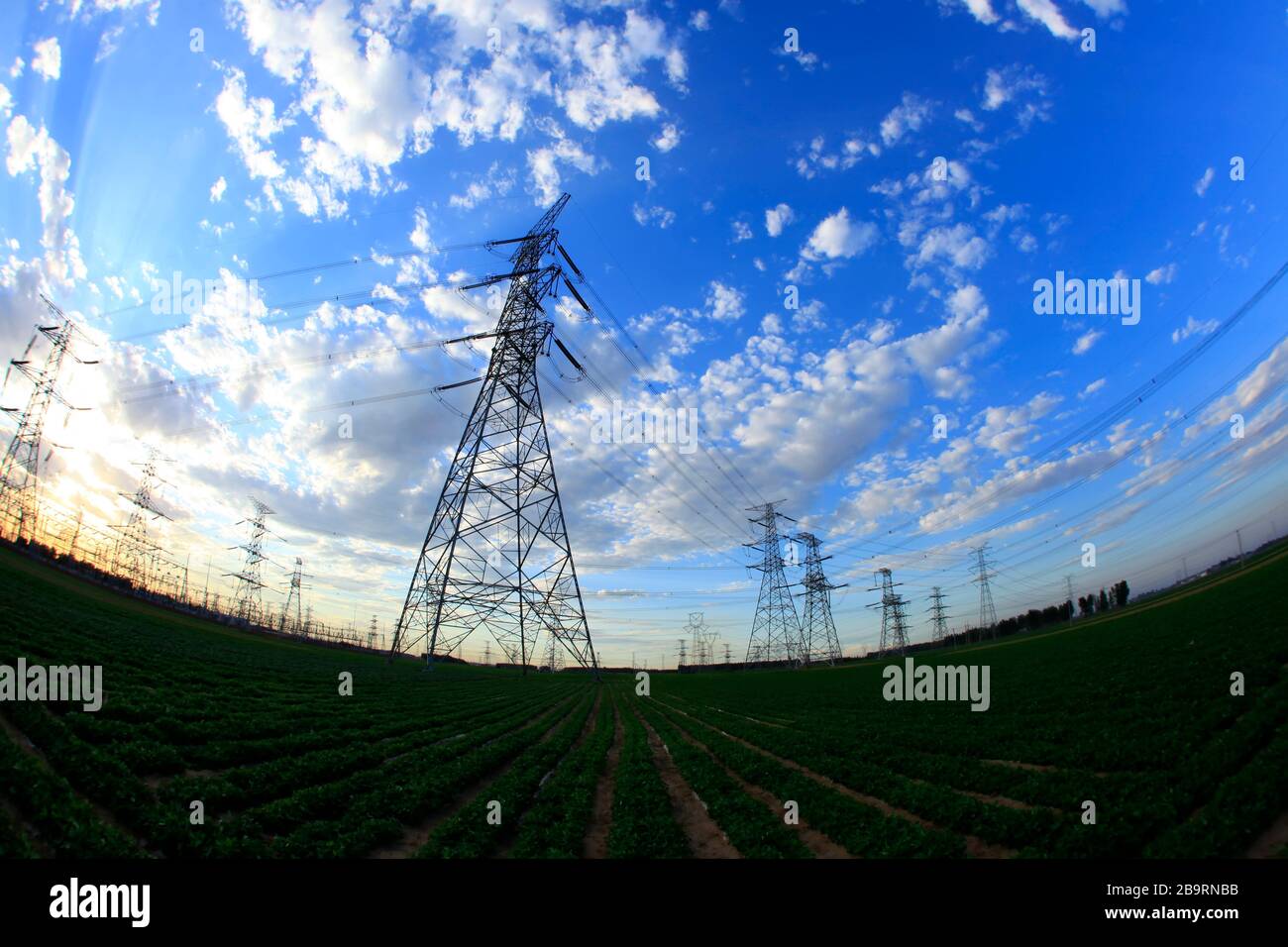Pylon, the pylon under the blue sky white clouds Stock Photo - Alamy