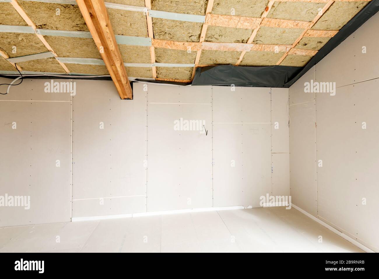 Gypsum board ceiling house construction hires stock photography and