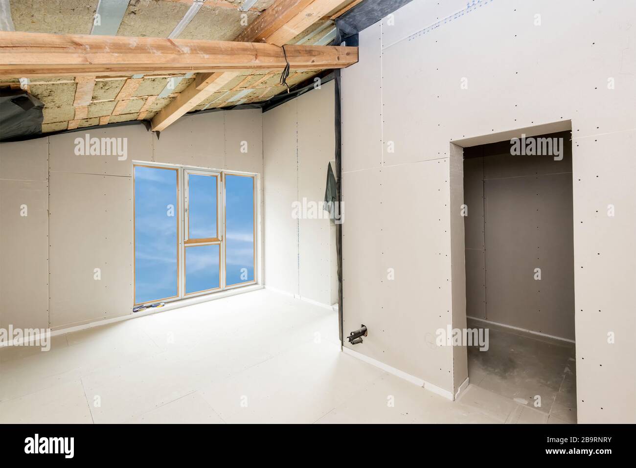 Gypsum board ceiling house construction hires stock photography and