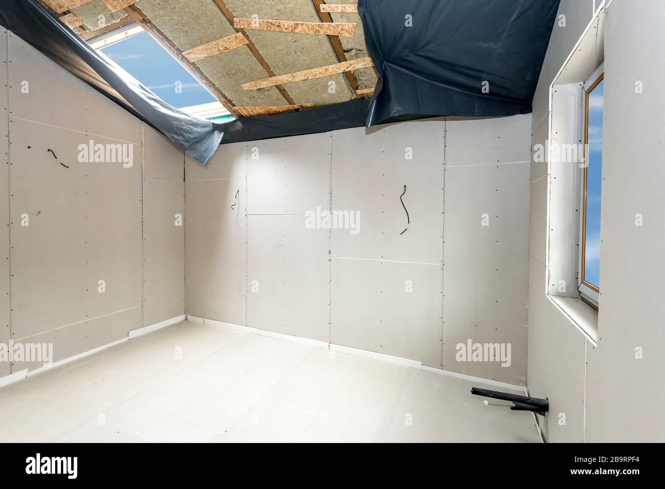 Gypsum board ceiling house construction hires stock photography and