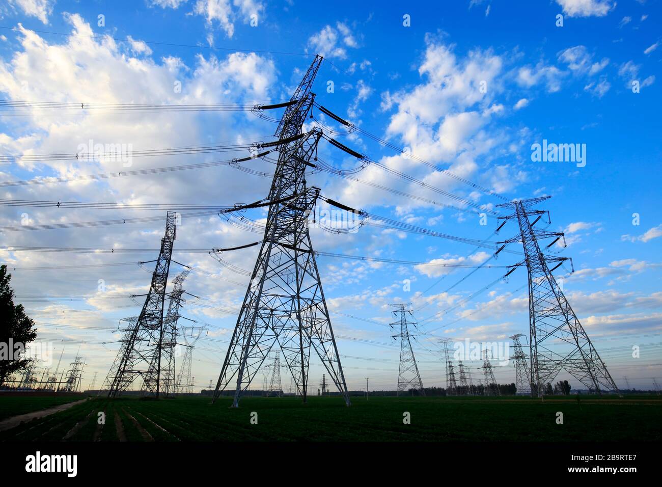 Pylon, the pylon under the blue sky white clouds Stock Photo - Alamy