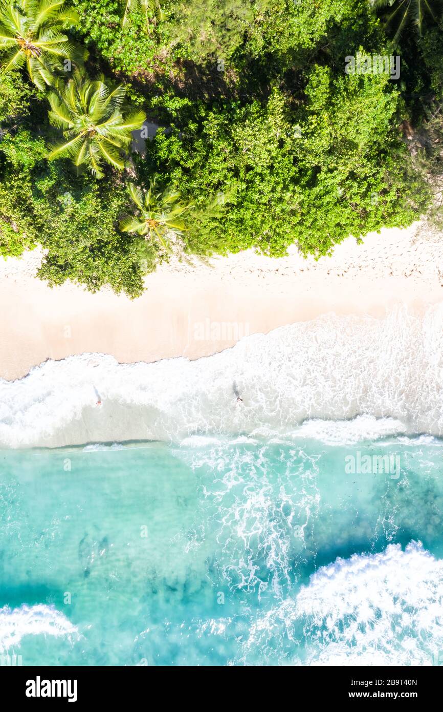 Seychelles Takamaka beach Mahe portrait format vacation paradise ocean drone view aerial photo photography Stock Photo