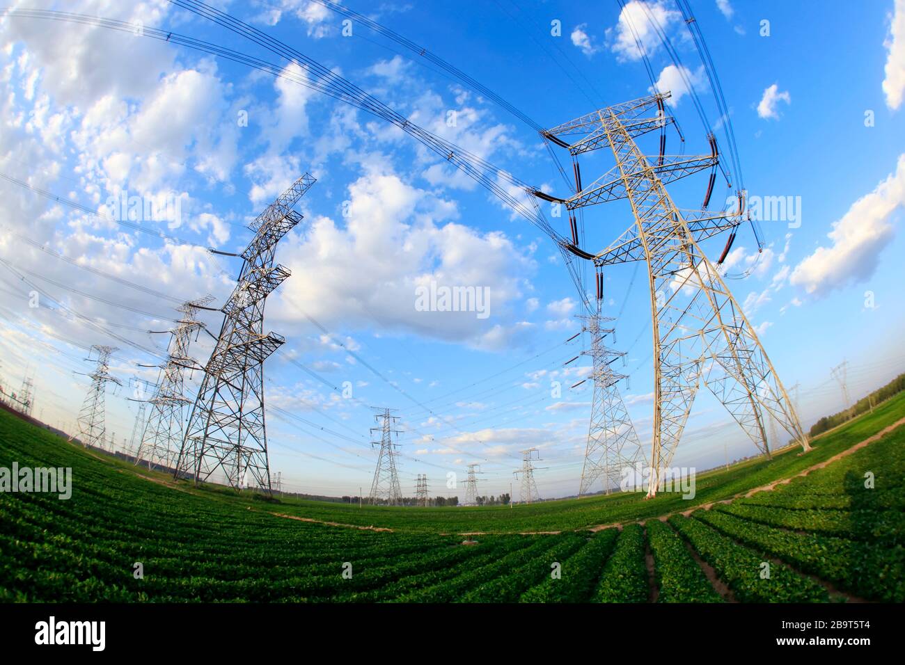 Pylon, the pylon under the blue sky white clouds Stock Photo - Alamy