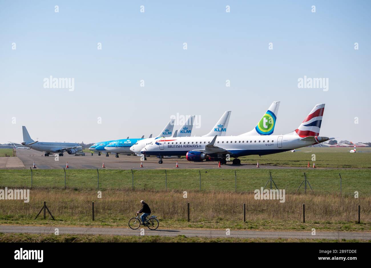 British Airways, KLM and Transavia aircraft parked at Norwich Airport after reduced flights amid travel restrictions and a huge drop in demand as a result of the coronavirus pandemic. Stock Photo