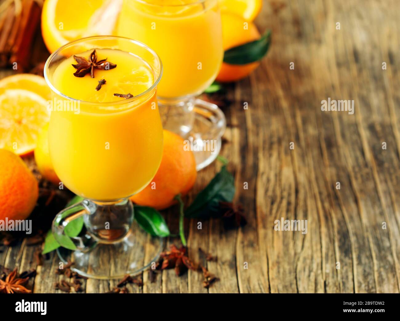 Hot orange drink. Winter Orange Punch, copy space Stock Photo Alamy