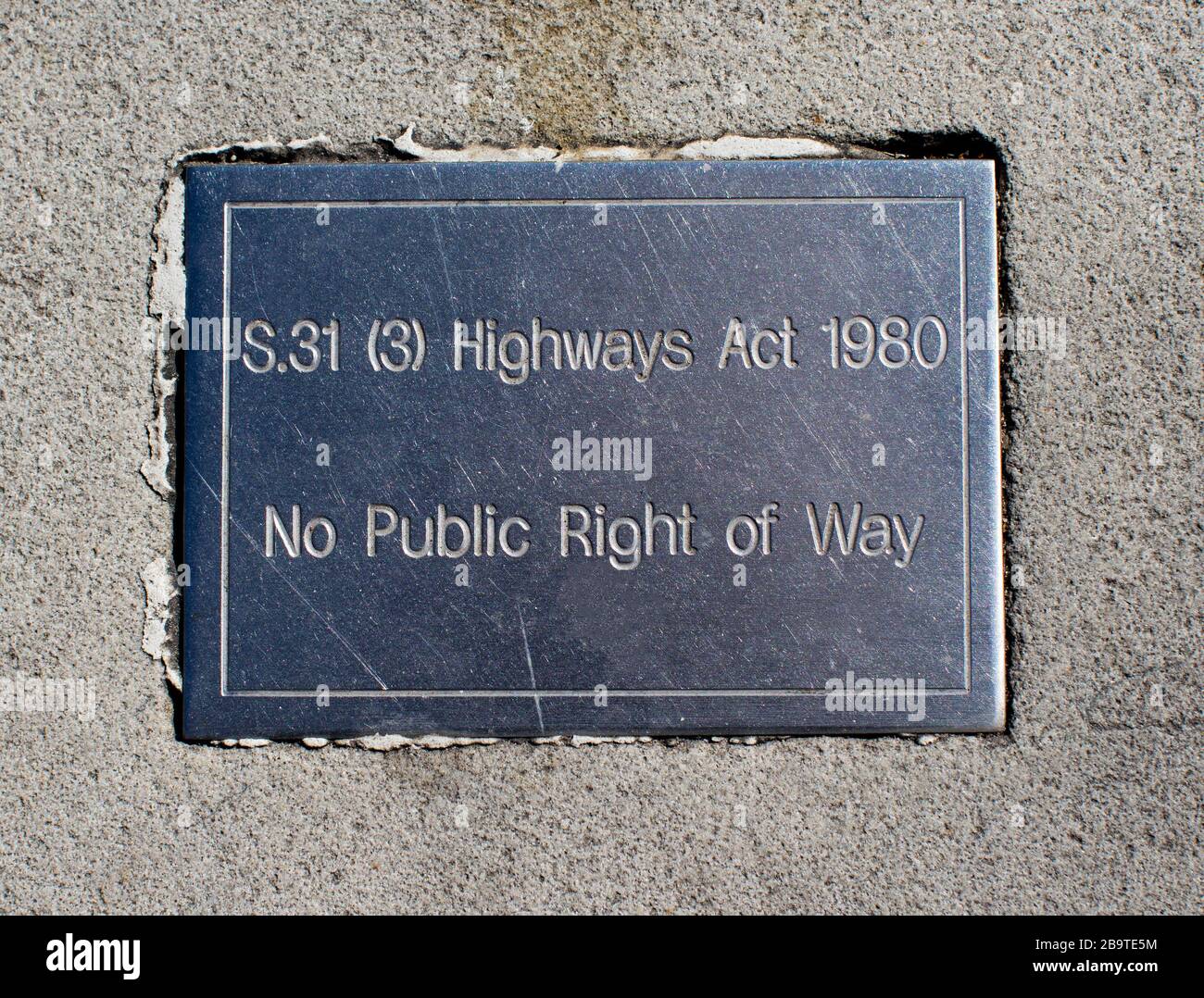 Sign indicating No Public Right of Way according to Highways Act, 1980, set into pavement on Duke of York Square, off the Kings Road, Chelsea, London Stock Photo