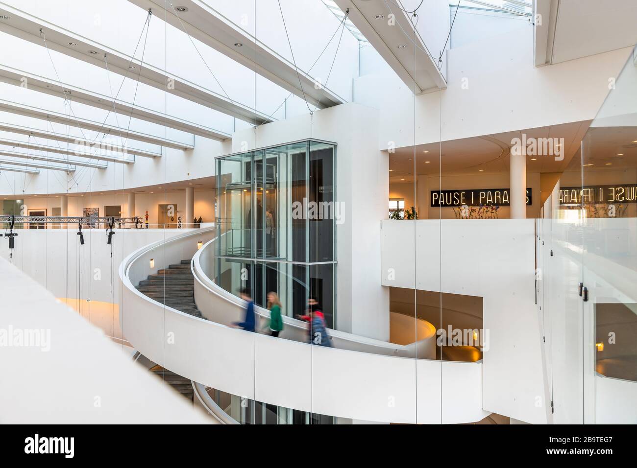 Inside the ARoS art gallery in Aarhus, Denmark. Designed by architects Schmidt Hammer Lassen. Galleries are accessed via a central spiral staircase. Stock Photo