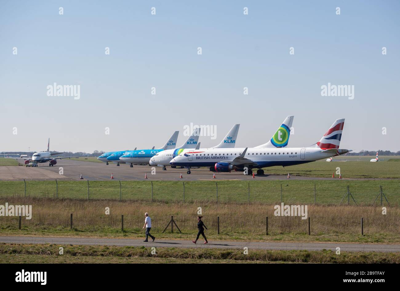 British Airways, KLM and Transavia aircraft parked at Norwich Airport after reduced flights amid travel restrictions and a huge drop in demand as a result of the coronavirus pandemic. Stock Photo