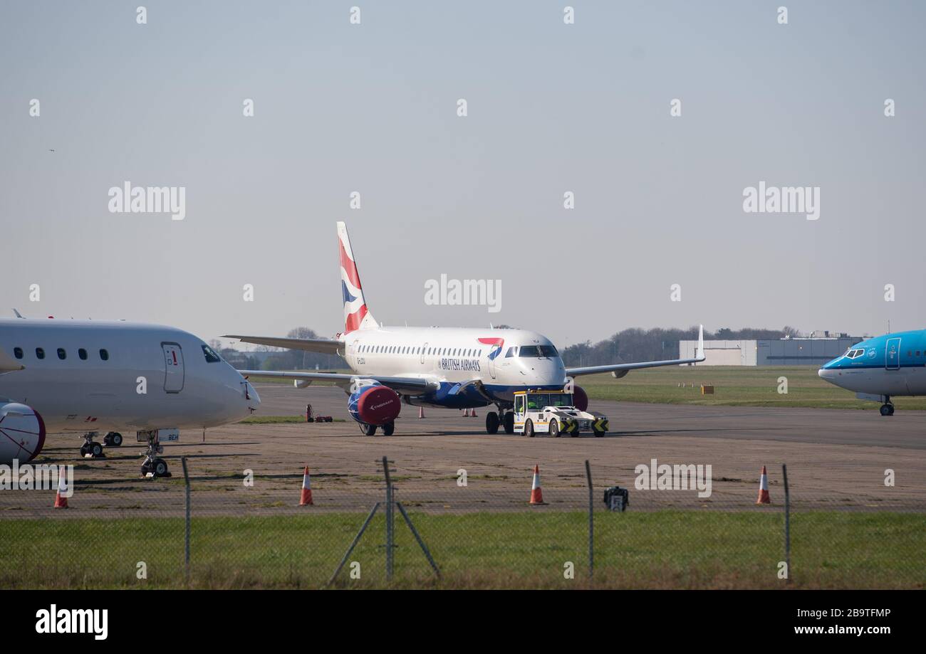 A British Airways aircraft is moved at Norwich Airport after reduced flights amid travel restrictions and a huge drop in demand as a result of the coronavirus pandemic. Stock Photo