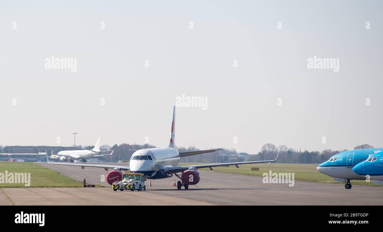 A British Airways aircraft is moved at Norwich Airport after reduced flights amid travel restrictions and a huge drop in demand as a result of the coronavirus pandemic. Stock Photo