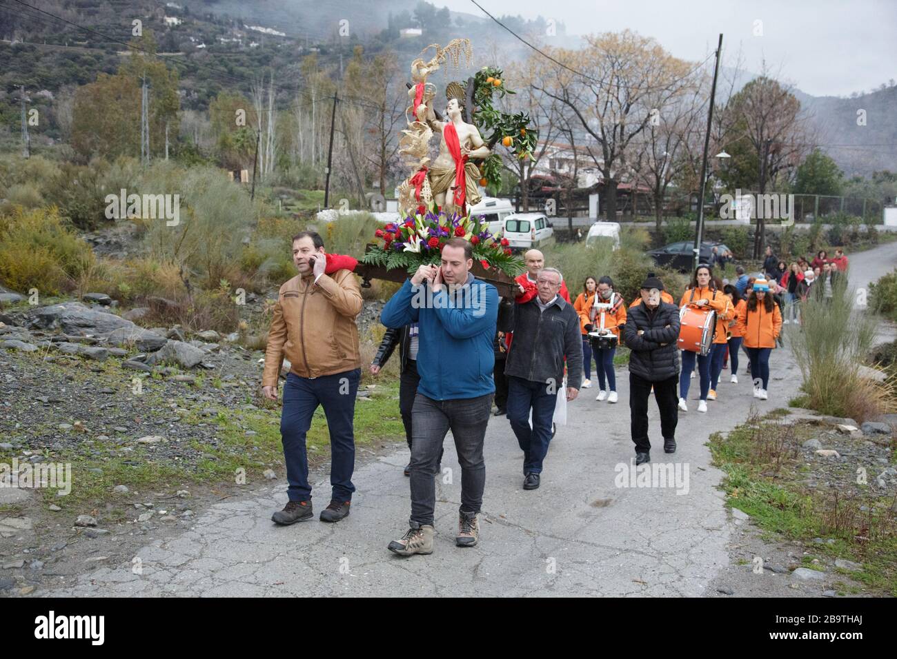 A religious procession for the Catholic festival of Saint Sebastian, Bayacas village, near Órgiva, Granada, Andalusia, Spain, 25 January 2020 Stock Photo