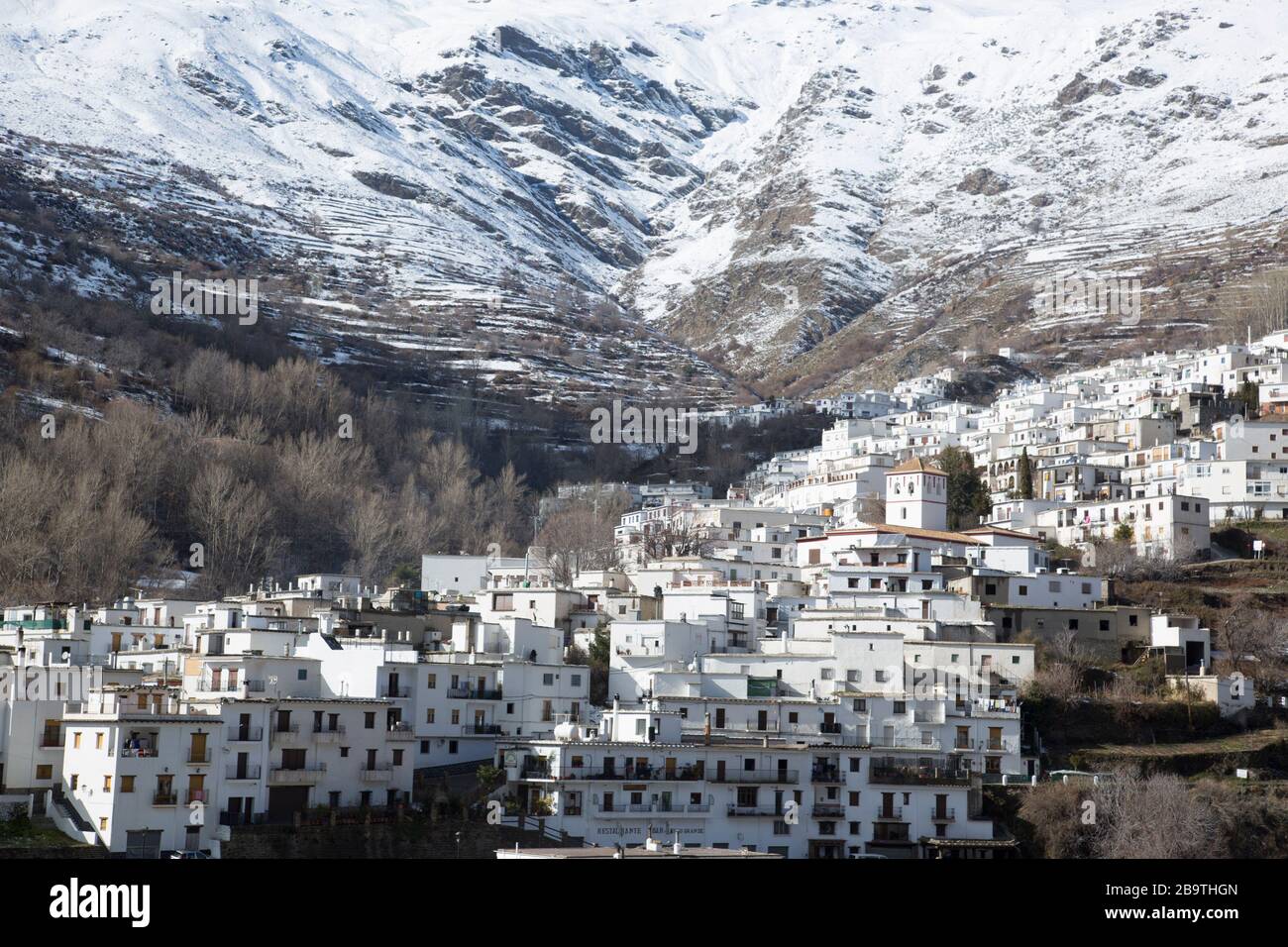 Trevelez in a winter landscape with snow, Granada province, Andalucia, Spain Stock Photo
