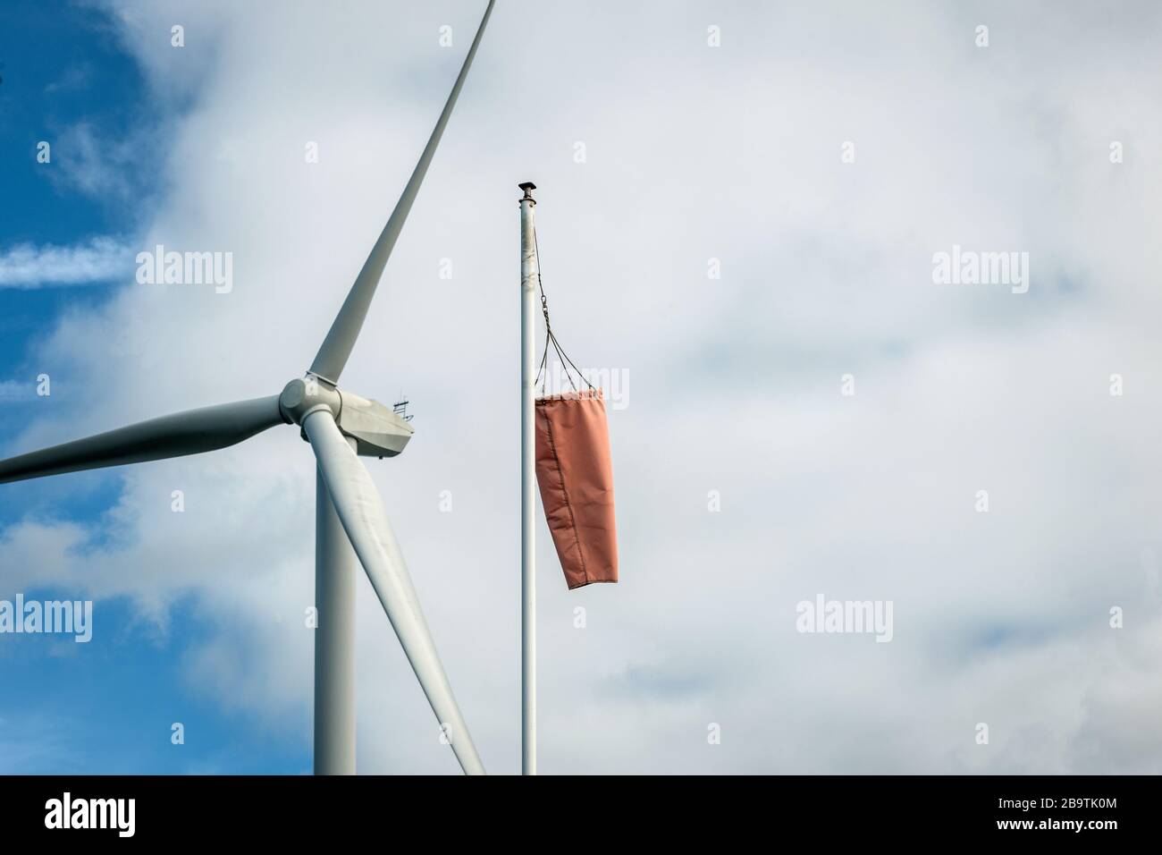 wind turbine and wind sock Stock Photo