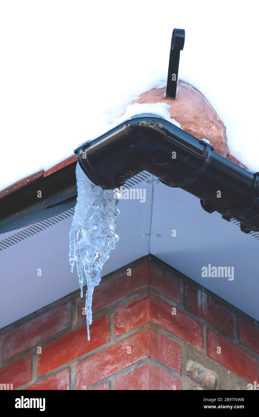 Oil paint of icy pipe roof Stock Photo Alamy