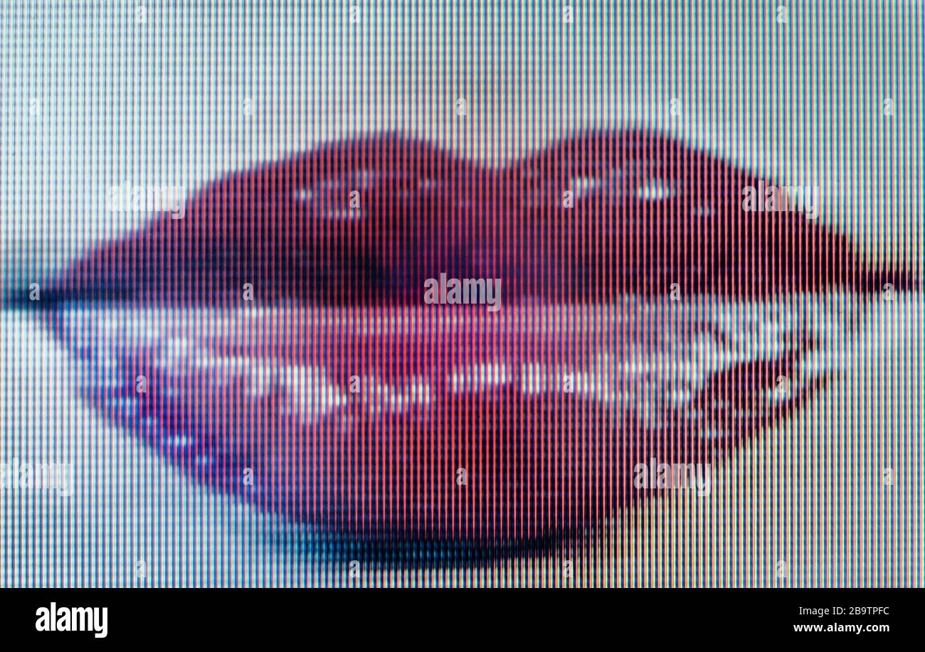 Female lips displayed pixelated on digital screen Stock Photo