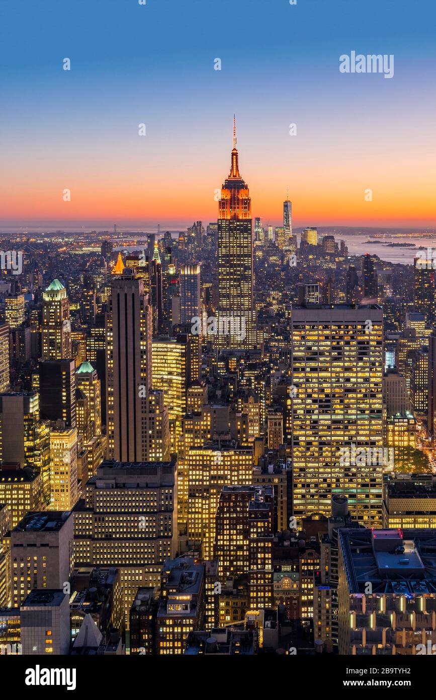 Midtown Manhattan skyline with Empire State Building at dusk, New York, USA Stock Photo