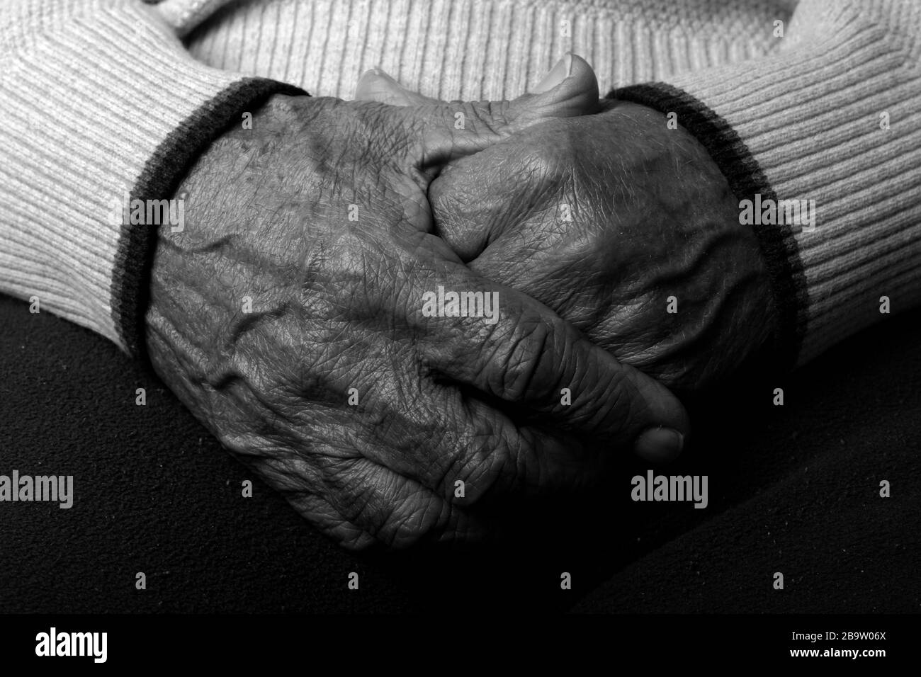 Alexandria, Egypt January 14, 2020  black and white photo of an 87 year old man with wrinkles on his face and old hands Stock Photo