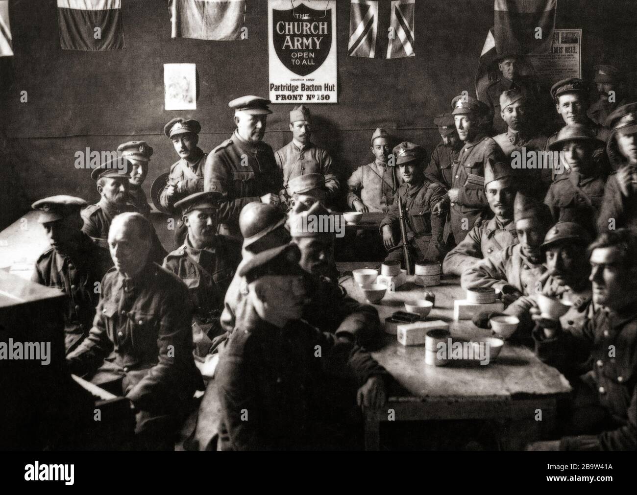 R&R for British and French troops in a church army hut following the Battle of the Lys, also known as the Fourth Battle of Ypres, fought from 7 April to 29 April 1918 and was part of the German Spring Offensive in Flanders during World War with the unsuccessful objective of capturing Ypres, forcing the British forces back to the Channel ports and out of the war. Stock Photo