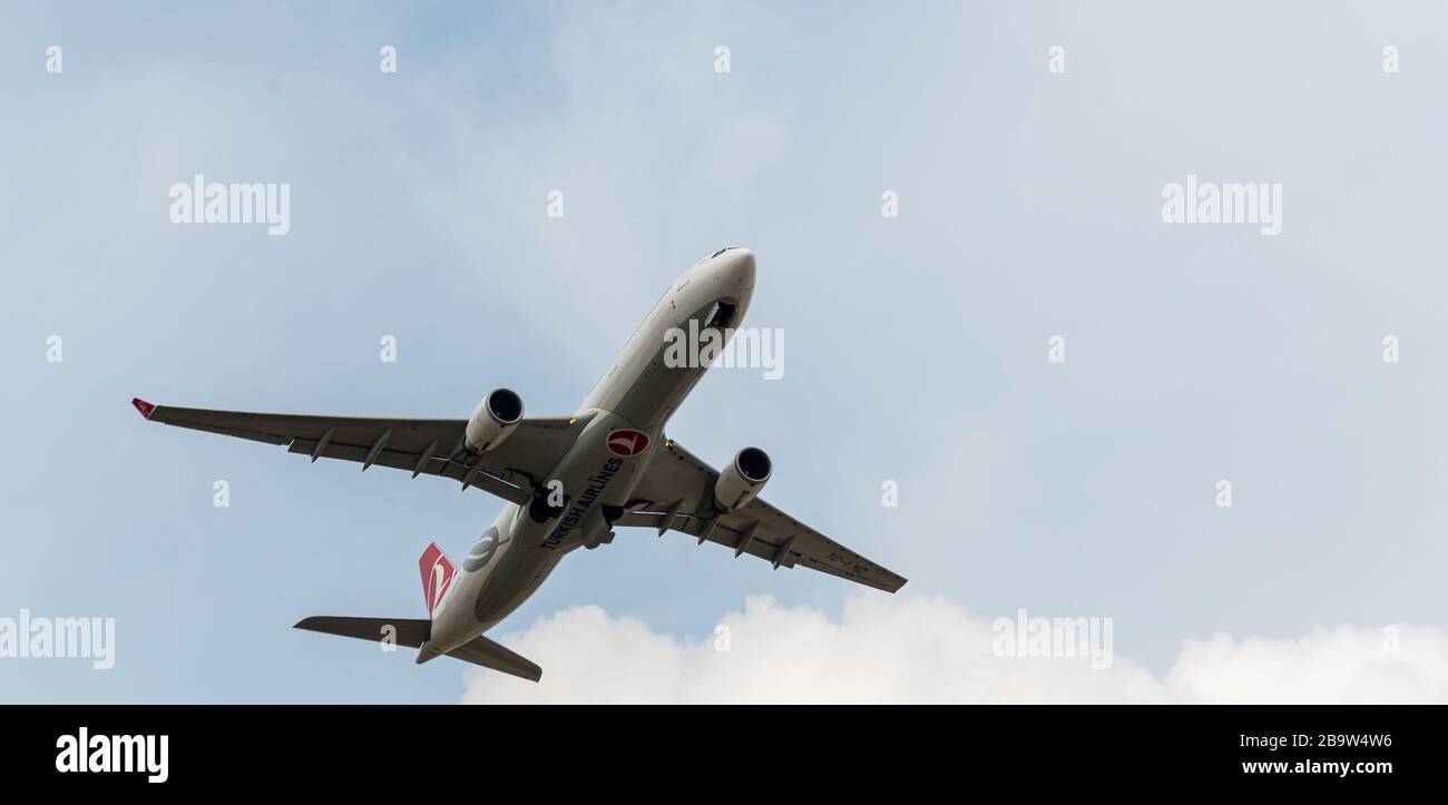 Heathrow, United Kingdom - August 03 2019:   Turkish Airlines Airbus A330-303 registration TC-LND, flight number TK1980 departs Heathrow airport en ro Stock Photo