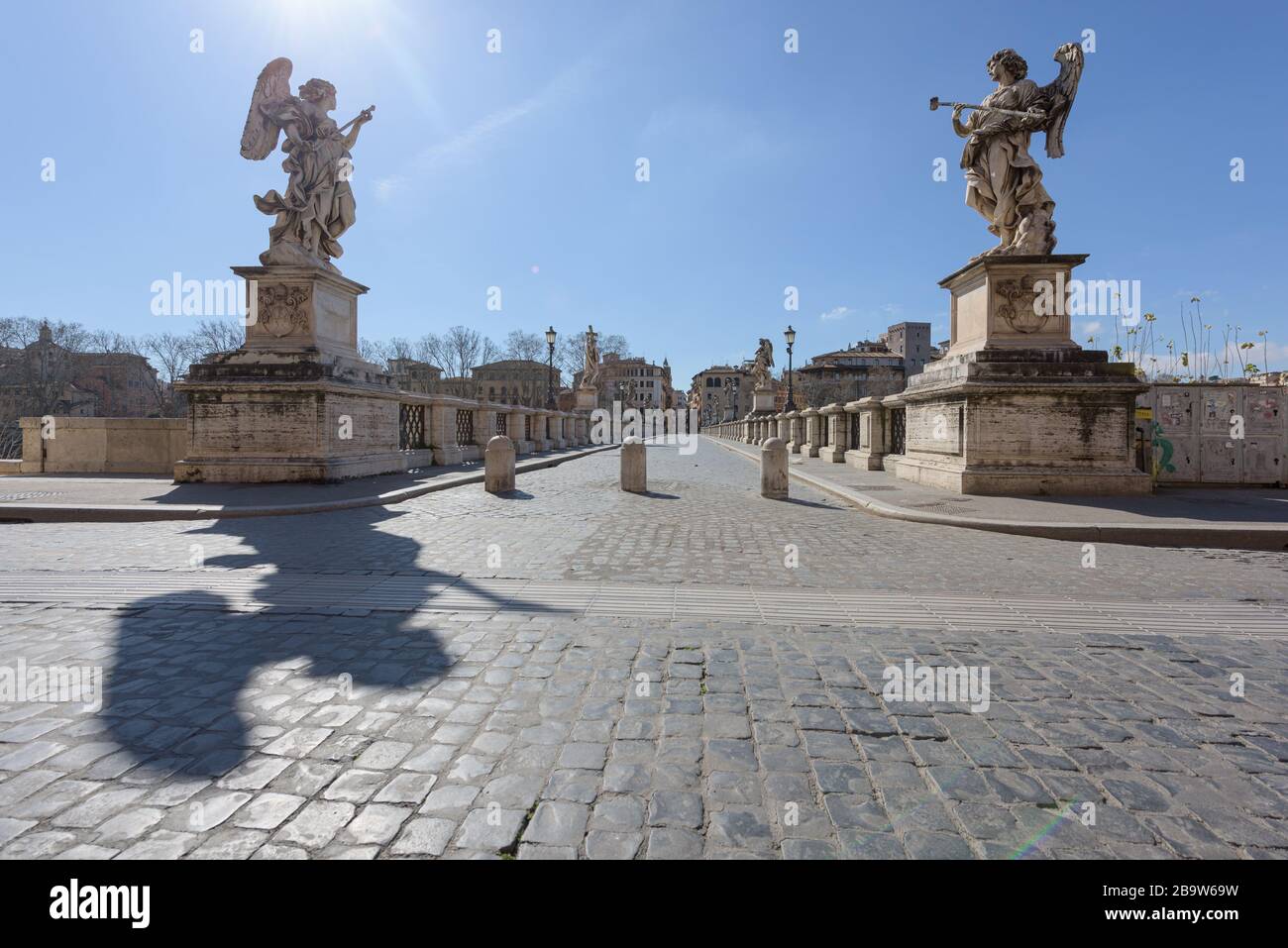ROME, ITALY - 12 March 2020: the popular tourist spot of the Saint'Angelo bridge is now deserted, a rare sight in Rome, Italy. Today, the Italian gove Stock Photo