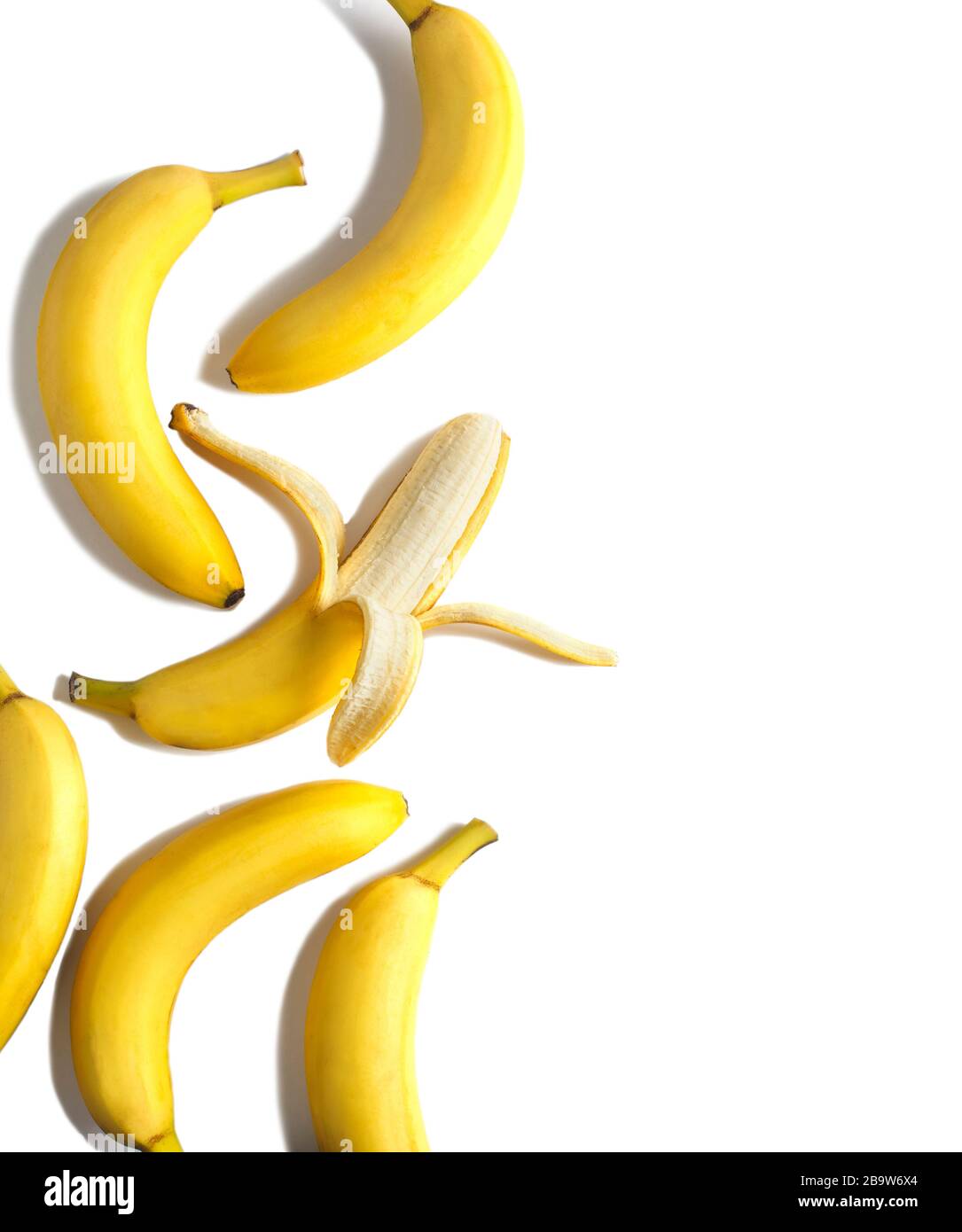 Ripe bananas on white background, flatlay, copy space Stock Photo