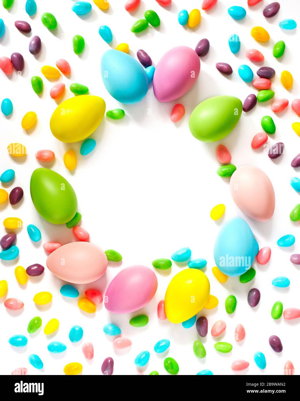 Easter eggs and candy background with copy space Stock Photo
