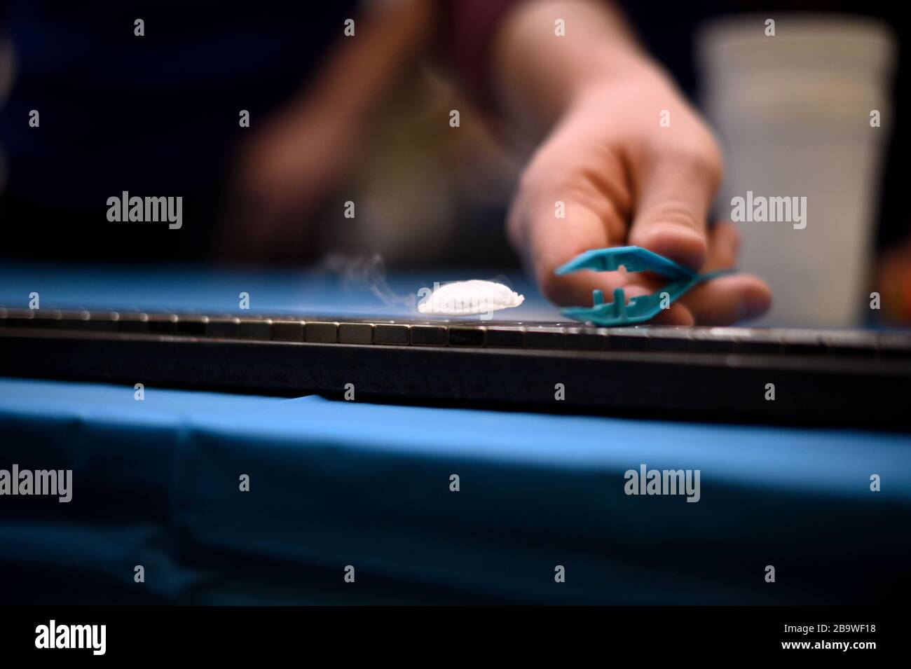 Magnetic levitation is demonstrated with a STEM experiment at a science festival. Stock Photo